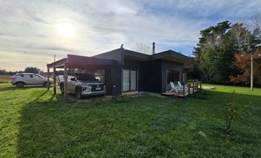 Oportunidad de Inversión en Valdivia: Casa Mediterránea + 4 Cabañas Amobladas