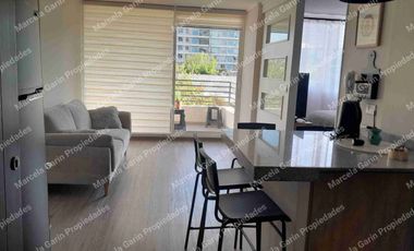 Arriendo departamento amoblado con estacionamiento en la Reina