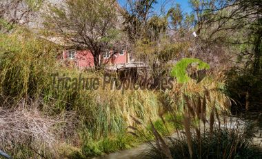 Venta de sitio urbano con casa en Huanta, orilla de carretera y río. Valle del Elqui. $47 millones