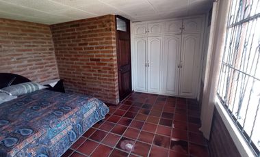 Vendo un Terreno con Casa en Pifo