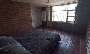 Vendo un Terreno con Casa en Pifo