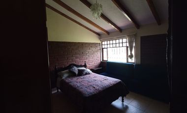 Vendo un Terreno con Casa en Pifo
