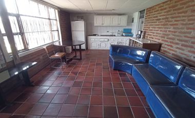 Vendo un Terreno con Casa en Pifo