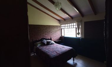 Vendo un Terreno con Casa en Pifo