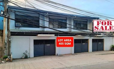 Commercial Lot with Income Generating Structure