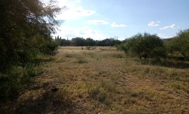 Terreno a pie de carretera, con uso de suelo habitacional