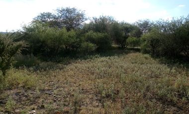 Terreno a pie de carretera, con uso de suelo habitacional