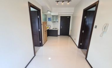 BELOW MARKET PRICE 2 BR UNIT FOR SALE in The Trion Towers beside SM Aura and High Street