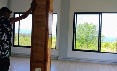 OCEAN VIEW HOUSE AND LOT FOR SALE IN SIQ0136