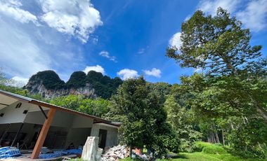 Almost 4 Rai of land and houses with Fantastic Mountain views are for sale in Khao Thong, Krabi