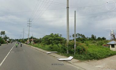 Commercial Lot in Magay, Composteal, Cebu along National Highway with Beach Front