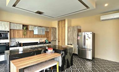 Residencia con Alberca y justo adentro del Campo de Golf en el Residencial Punta Tiburón.