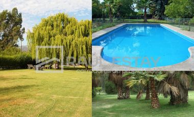 Vendemos terreno con piscina y jardines en Curimón