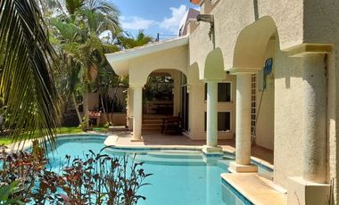 Hermosa casa con piscina en residencial de Puerto Aventuras, 3 minutos al mar