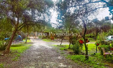 Leon Propiedades vende parcela con casa en La Aurora, Curacavi