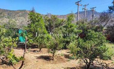 Leon Propiedades vende parcela plana con 2 casas en sector Cuyuncavi, Curacavi