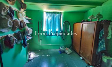 Leon Propiedades vende parcela plana con 2 casas en sector Cuyuncavi, Curacavi