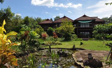 Experience Eco-Tourism Bliss: Remarkable Home & 64+ Rai Land for Sale in Nakhon Phanom, Thailand - A Green Paradise Awaits.