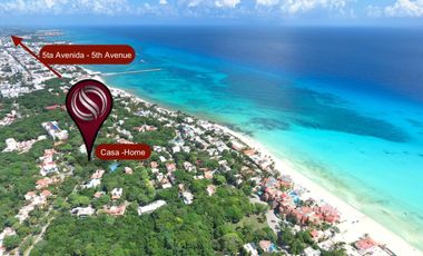 Casa de 4 recamaras con alberca privada, acceso al mar 2 departamentos independientes en venta en Playacar Fase 2.