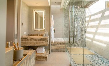 Luxurious 2-Bedroom Beachfront Condo with Indoor Parking at Aruga Resort and Residences, Mactan