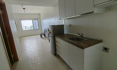 Semi-furnished Studio Condo Unit (36th Floor) at Aspire Tower - Nuvo City for SALE