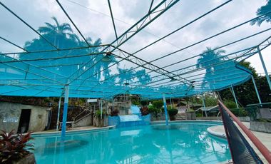 Hot Spring Resort for sale in Pansol Laguna good location near National High way