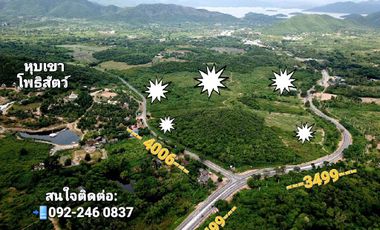 Land for sale on the main road, location, surrounding mountains, good atmosphere, area of 210 rai