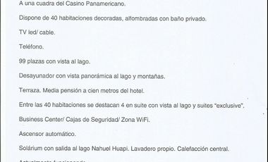 Hotel sobre costa de Lago