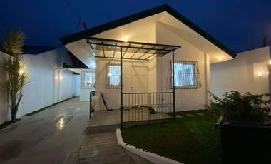 HOUSE FOR SALE IN BACOLOD CITY: Lovely white house in the heart of the city, ideal for professionals, young couples or retirees