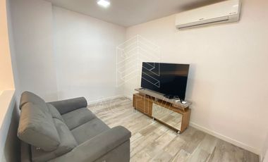 Departamento esquinero con balcón en Venta, edificio Santana Lofts