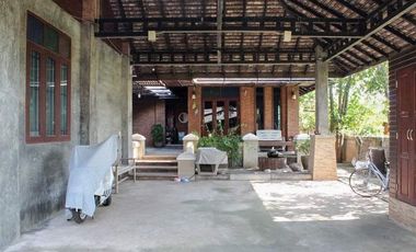 Explore this captivating Lanna-style Thai house for sale in the center of Chiang Rai.