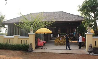 Explore this captivating Lanna-style Thai house for sale in the center of Chiang Rai.