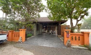 Explore this captivating Lanna-style Thai house for sale in the center of Chiang Rai.