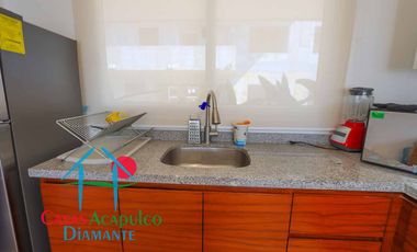 Departamento en condominio con club de playa. Terraza con vista a la alberca