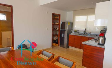 Departamento en condominio con club de playa. Terraza con vista a la alberca