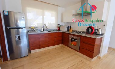 Departamento en condominio con club de playa. Terraza con vista a la alberca
