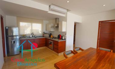 Departamento en condominio con club de playa. Terraza con vista a la alberca