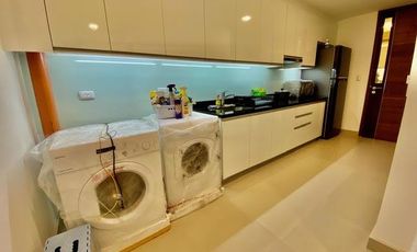 Interior designed 3 bedroom unit for rent at Two Roxas Triangle