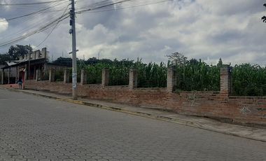 CHECA, vendo terreno 1.500m, con casa y local comercial, servicios básicos