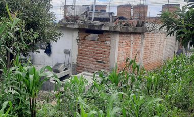 CHECA, vendo terreno 1.500m, con casa y local comercial, servicios básicos