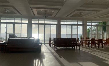 For Sale: Glass Beach House in Compostela with Foreshore Lease