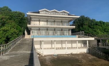 For Sale: Glass Beach House in Compostela with Foreshore Lease