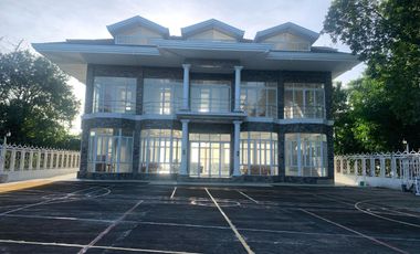 For Sale: Glass Beach House in Compostela with Foreshore Lease