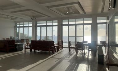 For Sale: Glass Beach House in Compostela with Foreshore Lease