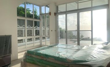 For Sale: Glass Beach House in Compostela with Foreshore Lease
