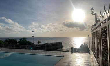 For Sale: Glass Beach House in Compostela with Foreshore Lease