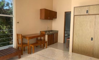 For Sale: Glass Beach House in Compostela with Foreshore Lease