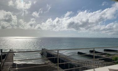 For Sale: Glass Beach House in Compostela with Foreshore Lease