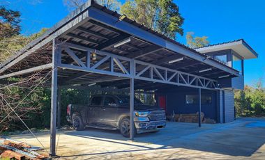 Parcela de 1,5 ha con casa, departamento y acceso a playa en Futrono, Lago Ranco