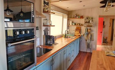 Parcela de 1,5 ha con casa, departamento y acceso a playa en Futrono, Lago Ranco